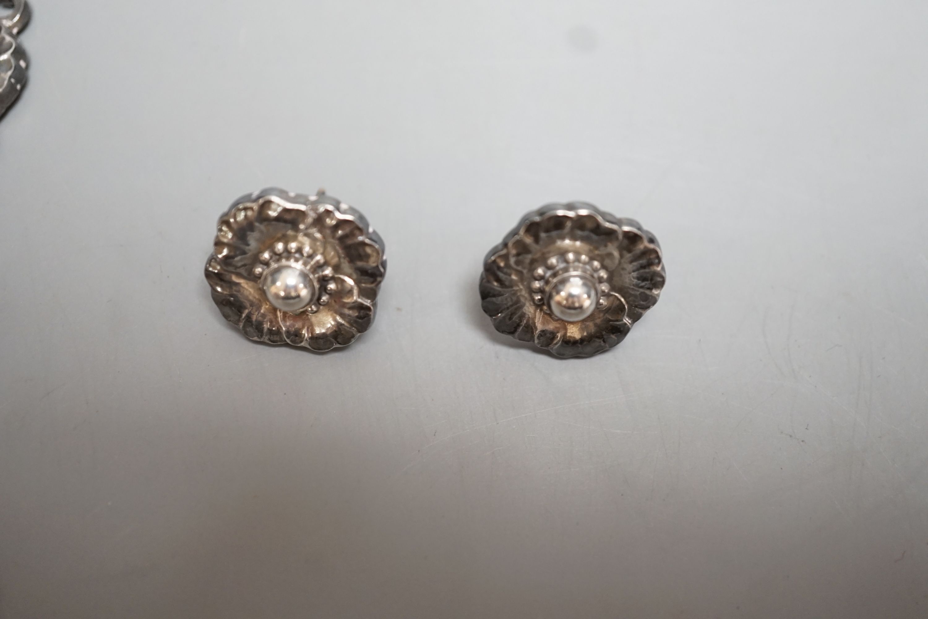 A Georg Jensen sterling flowerhead fringe necklace, no. 30A, 65cm and a pair of matching earrings, no.49
